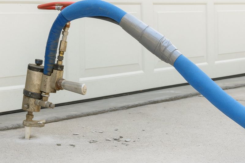 How Commercial Concrete Mudjacking Restores Uneven Surfaces